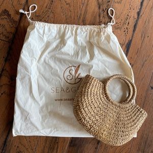 Sea and Grass woven purse- never used! Comes with dust bag.